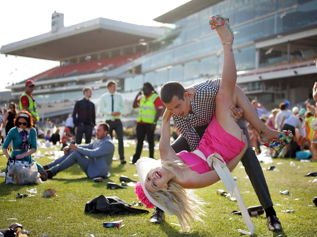 This happy couple celebrate at the 2013 Cup. Picture: Nicole Cleary