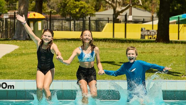 Brooklyn, 10, Ruby, 13, and Alfie, 12 at the Marion Outdoor Pool in Park Holme. Picture: Matt Loxton