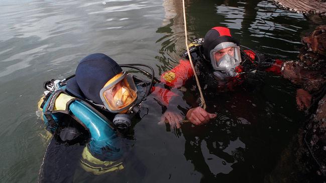 Star Force divers searching for Daniel Sheppard in the Port River in 1995.