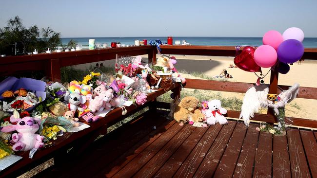 Memorial scene of where a baby washed up at Surfers Paradise Beach. Pics Adam Head