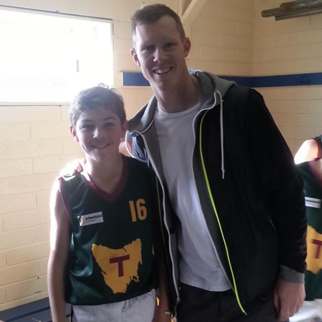 Richmond debutant Sam Banks with Tasmanian and club legend Jack Riewoldt during his under-12s days at the Devils.