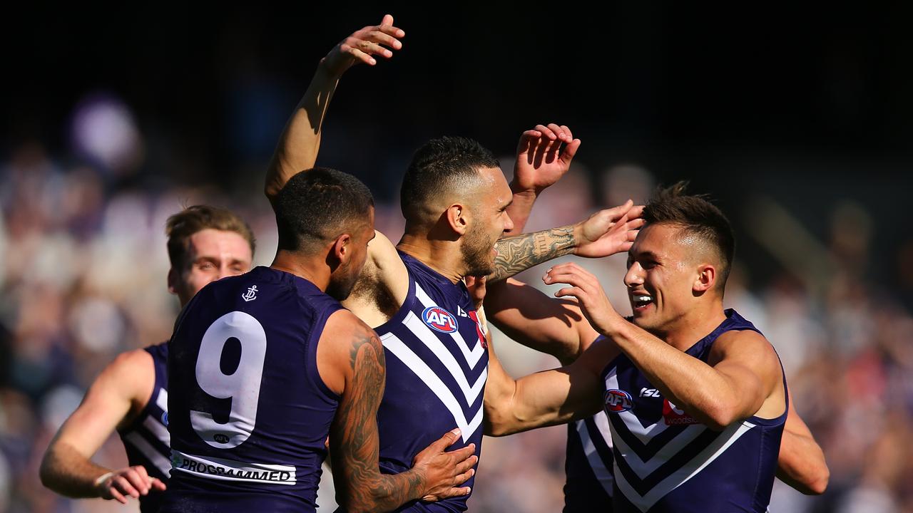 Harley Bennell celebrates a goal during his time at Fremantle.