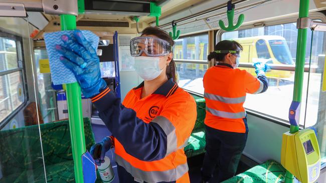 Lina Restrepo and Tina Gage clean trams ahead of each service. Picture: Alex Coppel