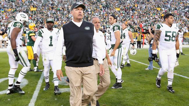 Head coach of the Jets Rex Ryan looks understandably dejected at Lambeau Field.