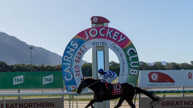 Horse Bombasy and Jockey Jason Taylor finishing first