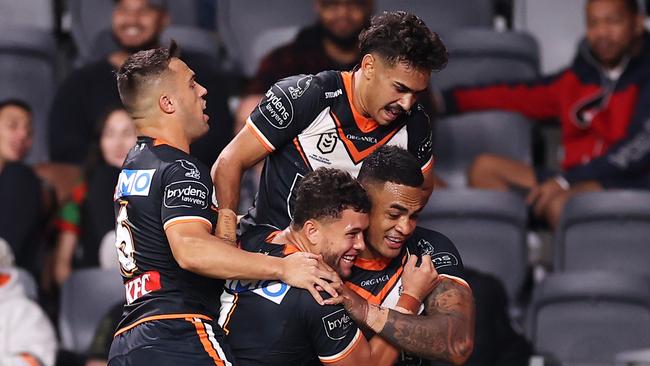 The Wests Tigers celebrate a try against South Sydney. Picture: Mark Kolbe/Getty Images