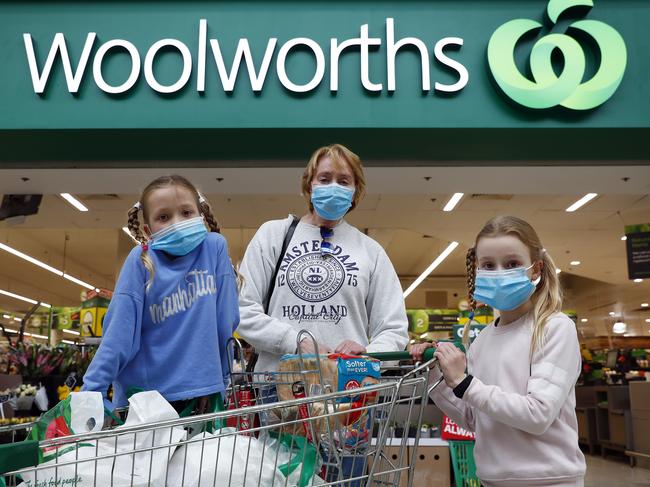 Susan Duffy and her granddaughters Imogen (left) and Alexis Schroder wore their masks while shopping at Liverpool Woolworths on Saturday. Picture: Sam Ruttyn