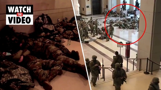 Exhausted National Guard troops sleep in Capitol hallways