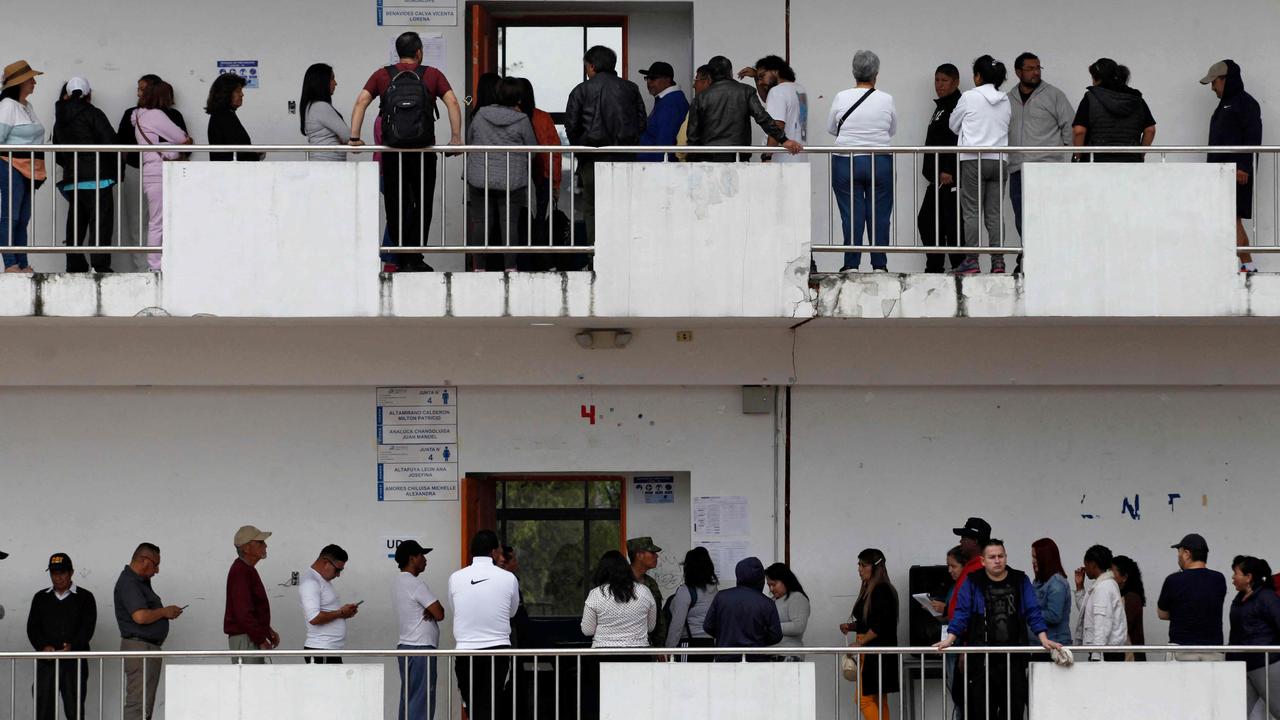 People queue to vote at a polling station in Quito during the Ecuadorean presidential election and referendum on mining and petroleum, on August 20, 2023. Picture: Galo PAGUAY / AFP