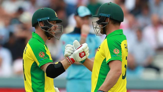 Warner (L) and Aaron Finch have been the tournament’s most productive opening pairing. Picture: Getty