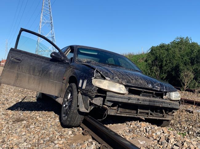 A man has been arrested for allegedly evading police before smashing into a patrol car on Friday morning. Picture: SA Police