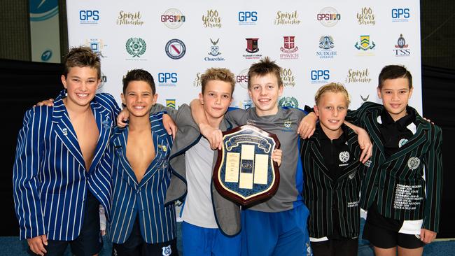 Anglican Church Grammar School, centre, won the junior GPS swimming championship from Nudgee College, left, and Brisbane Boys College. Photo: Brody Grogan