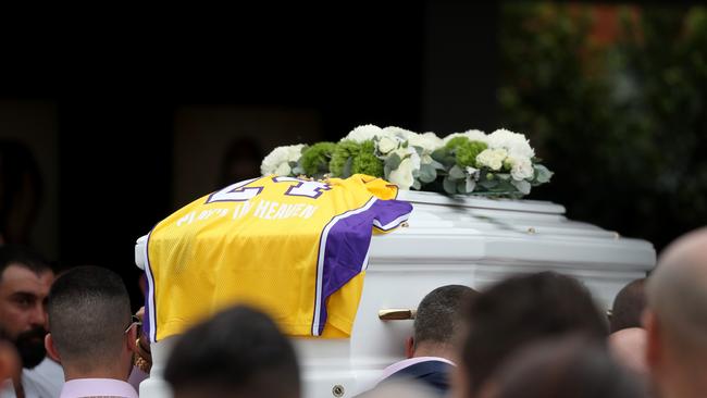 An LA Lakers jersey with the words 'Play 'A' In Heaven' on the casket of Antony Abdallah. Picture: Jonathan Ng