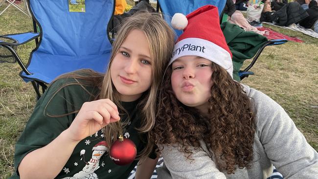 Templestowe friends Kiera Hosking and Mietta De Luise hang out at Manningham's Carols at Ruffey Lake Park.