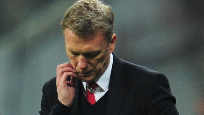 MUNICH, GERMANY - APRIL 09: David Moyes, manager of Manchester United looks dejected during the UEFA Champions League Quarter Final second leg match between FC Bayern Muenchen and Manchester United at Allianz Arena on April 9, 2014 in Munich, Germany. (Photo by Shaun Botterill/Getty Images)