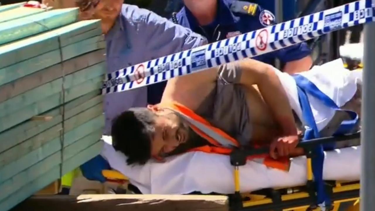 Antony Metledge was taken from the scene with a knife still in his back. Picture: 9 News