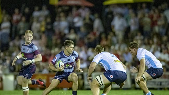 Reds centre James O'Connor looks for a way through the Waratahs defence in Dalby. picture: QRU Media