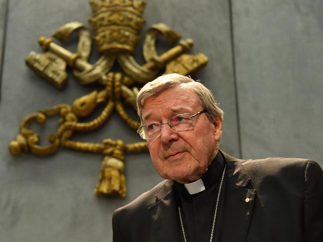 Australian Cardinal George Pell looks on as he makes a statement at the Holy See Press Office in the Vatican City. Picture: AFP Photo/Alberto Pizzoli