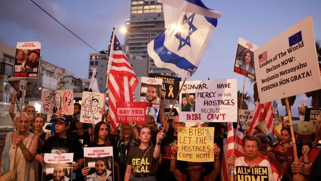 Families and supporters of Israeli hostages held by Hamas protest in front of the US Embassy in Tel Aviv. Picture: AFP.