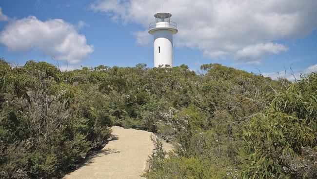 The Cape Tourville Lighthouse on the Freycinet Peninsula within the Freycinet National Park. Picture: Tourism Tasmania & Rob Burnett