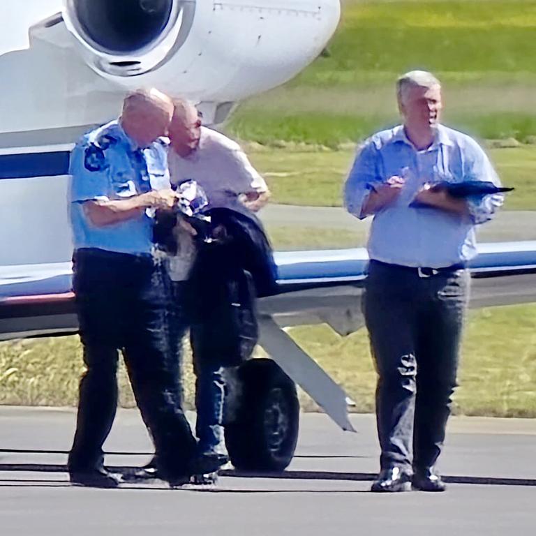 Police Commissioner Steve Gollschewski and Police Minister Mark Ryan (right) at Hervey Bay Airport