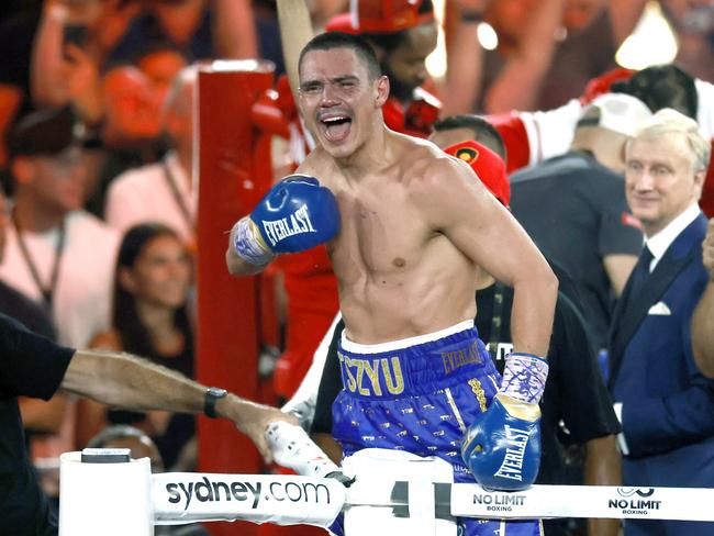 Tim Tszyu of Australia celebrates defeating Tony Harrison of USA during their interim World Boxing Organization (WBO) super-welterweight world title fight at Qudos Bank Arena in Sydney, Sunday, March 12, 2023. (AAP Image/Mark Evans) NO ARCHIVING, EDITORIAL USE ONLY