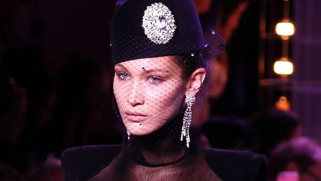 Bella Hadid is presented with tiara by admirer in Paris