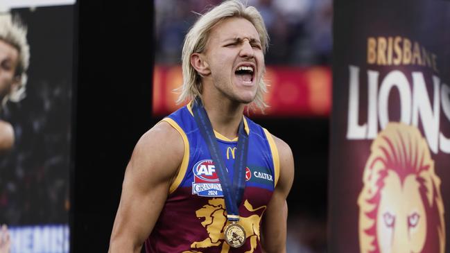 MELBOURNE, AUSTRALIA - SEPTEMBER 28: Kai Lohmann of the Lions celebrates winning the AFL Grand Final match between Sydney Swans and Brisbane Lions at Melbourne Cricket Ground, on September 28, 2024, in Melbourne, Australia. (Photo by Daniel Pockett/AFL Photos/Getty Images)