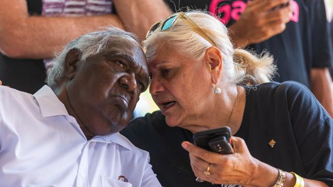 Galarrwuy Yunupingu AM listens to a translator as Australian Prime Minister Anthony Albanese speaks during the Garma Festival. Picture: Tamati Smith/ Getty Images