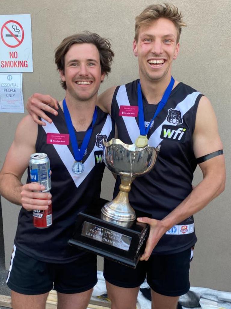 Shark attack victim Lance Appleby (left) with friend and teammate Ned Brooks after winning a flag for the Marble Range Football Club in 2021 which is in Port Lincoln Football League. Picture: Facebook