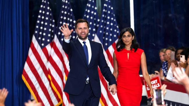 JD Vance arrives with wife Usha for a campaign rally at Herb Brooks National Hockey Centre in Saint Cloud, Minnesota, on Saturday. Picture: AFP