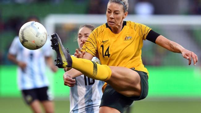 Alanna Kennedy clears the ball against Argentina 