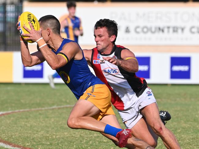 Southern Districts’ Dean Staunton applies some defensive pressure. Picture: Julianne Osborne.