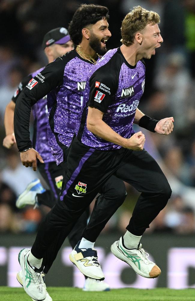 Riley Meredith of the Hurricanes celebrates the wicket of Moses Henriques of the Sixers during the BBL Qualifier match between the Hobart Hurricanes and Sydney Sixers at Ninja Stadium on January 21, 2025 in Hobart, Australia. Picture: Steve Bell/Getty Images