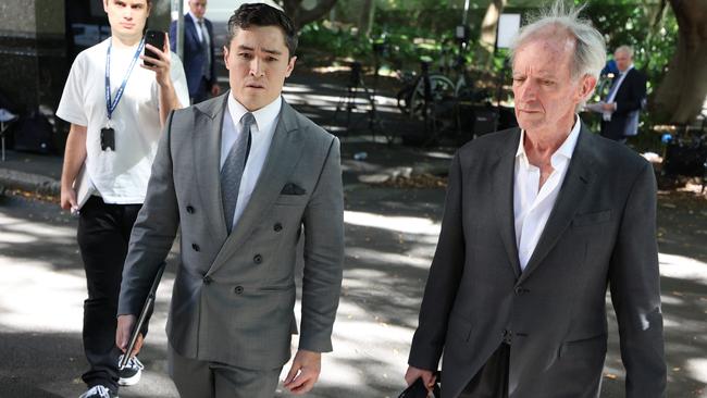 Defence lawyers Bryan Wrench, left, and Barrister Christopher Murphy at the Day Street Police Station, to meet their client Allan Jones. Picture: NewsWire / Dylan Coker