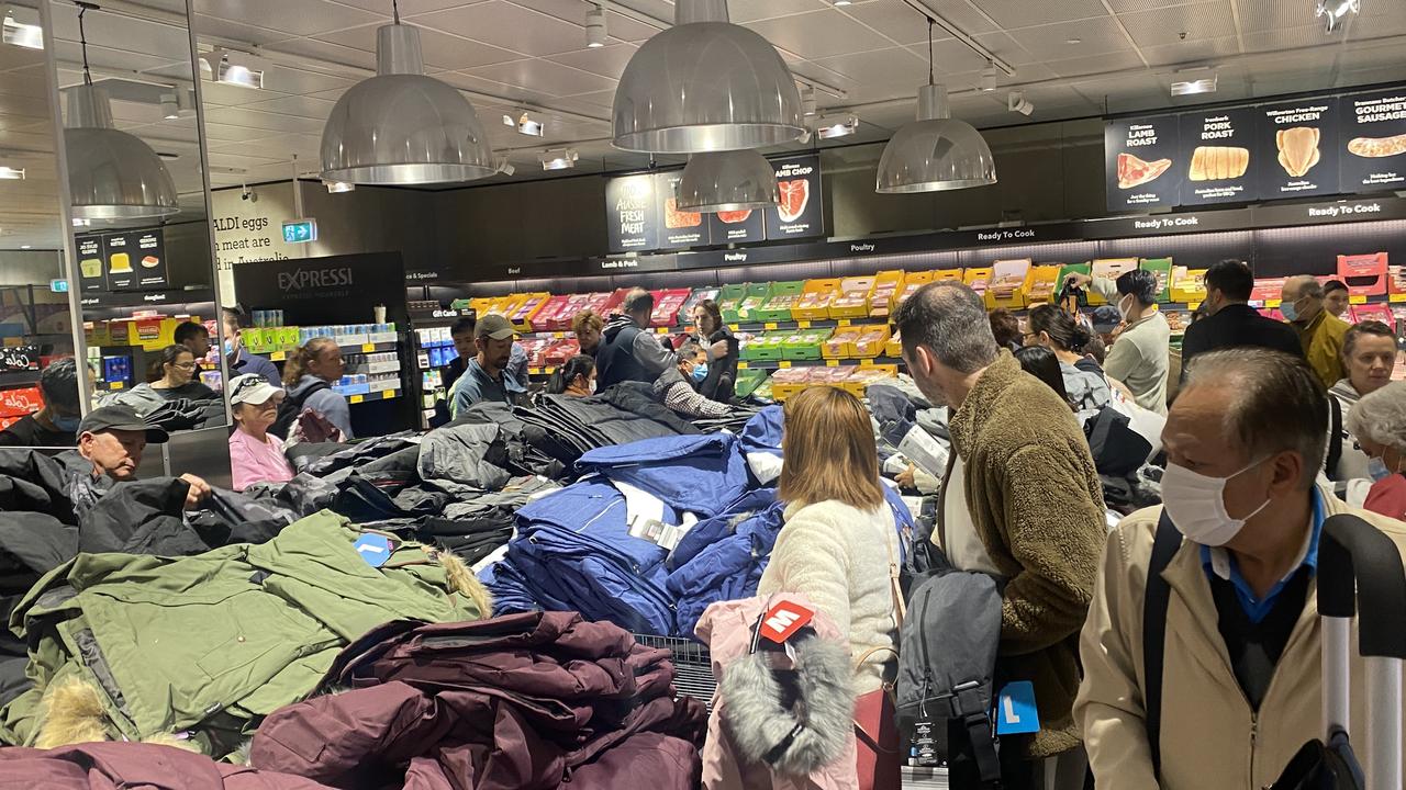 Shoppers worked in teams to grab a bargain. Picture: Vanessa Brown/news.com.au