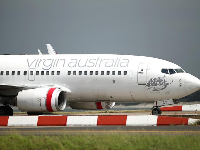 SYDNEY, AUSTRALIA - MARCH 14: A Virgin Australia commercial plane takes off at Sydney Airport on March 14, 2019 in Sydney, Australia. The Civil Aviation Safety Authority (CASA) has suspended operations of the Boeing 737 MAX 8 in Australia following a deadly crash that killed 157 people in Ethiopia on Sunday 10 March. Up until CASA's decision Fiji Airways was the only airline flying the Boeing 737 MAX 8 aircraft in Australia after Singapore's SilkAir announced it was temporarily ground its six aircraft on Tuesday. Safety concerns about the model of aircraft were first raised in October 2018 after a Lion Air flight in Indonesia crashed, killing all 189 people aboard. Since Sunday's crash in Ethiopia, Boeing has announced plans to update the aircrafts software. (Photo by Cameron Spencer/Getty Images)