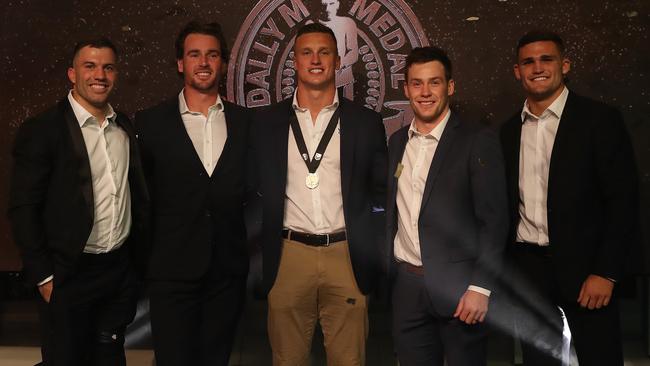 Jack Wighton (centre) celebrates his Dally M Medal win with (from left) James Tedesco, Clint Gutherson, Luke Keary and Nathan Cleary. Picture: Brett Costello