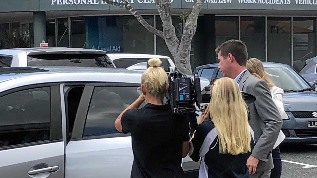 Brenda Leanne Macklin leaves court with a scrum of media in tow. Picture: Troy Kippen