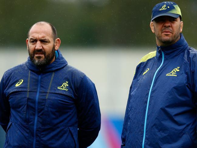 LONDON, ENGLAND - OCTOBER 05: Michael Cheika, Head Coach of Australia (r) and Mario Ledesma, Scrum Coach of Australia look on during a training session at Dulwich College on October 5, 2015 in London, United Kingdom. (Photo by Dan Mullan/Getty Images)