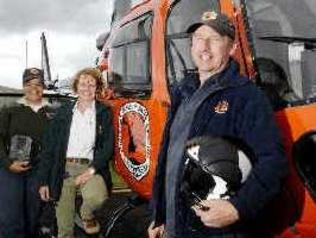 Huntin party: Ranger Liz Dargin (left), pest management officer Lisa Wellman and pilot Matt Hollingdale, all of the National Parks and Wildlife Service, will use a helicopter to locate and set baits for feral pigs in the Newrybar Swamp area. Picture: Jay Cronan