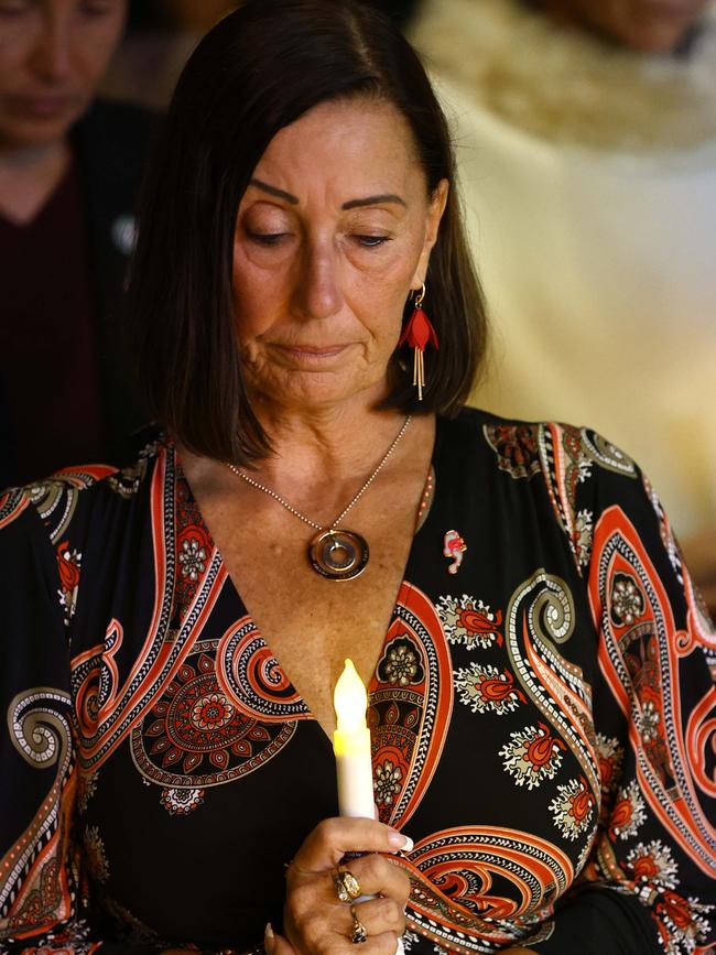 Sue Clark at a candle lighting vigil for National Domestic Violence Month.