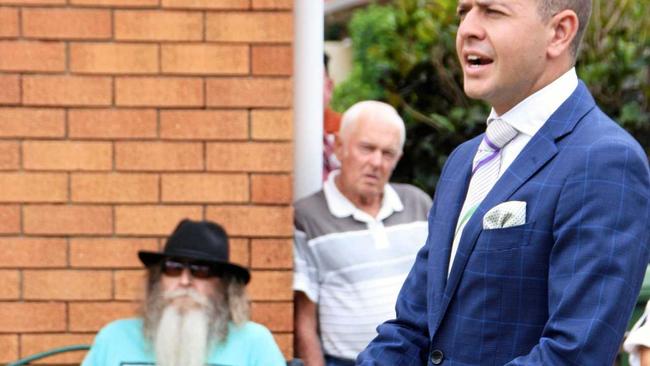 Auctioneer Jamie Thomas calls the bidding at 4 Gerrybell St, Golden Beach,  with Vicki Stewart of Stewart Property. Picture: Erle Levey