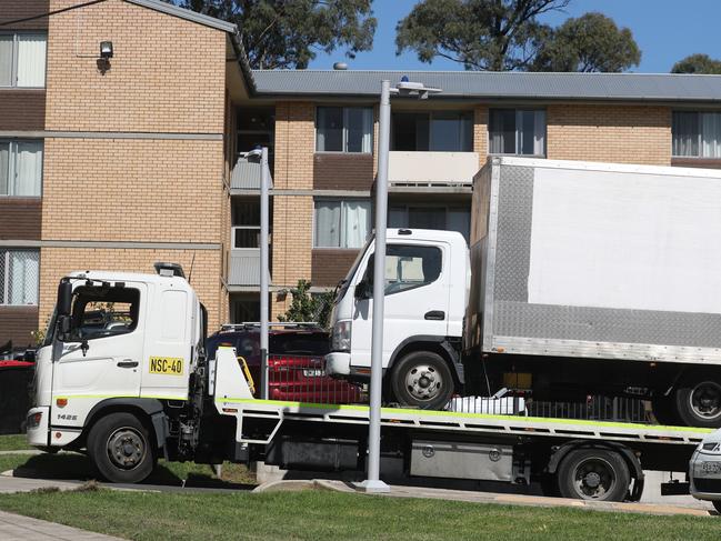 Police have sealed a truck and removed it via tow truck. Picture: John Grainger