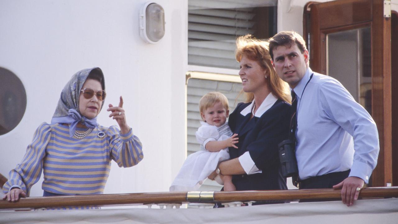 Queen Elizabeth II, Prince Andrew, Duke of York, and Sarah, the Duchess of York in 1989. (Photo by Julian Parker/UK Press via Getty Images)