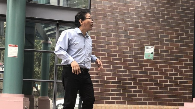 Homebush dentist Vi Minh Lam leaving Burwood Local Court during his 2021 court case. Picture: News Corp Australia