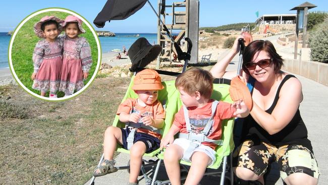 Karen with one of the strollers she used for her twins over the years. Image: Supplied