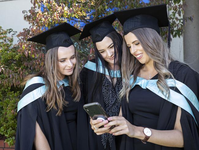 (l-R) Meg Wootton, Abbey Howard and Haylee Rowe at the UTAS Graduation at Burnie. PICTURE CHRIS KIDD