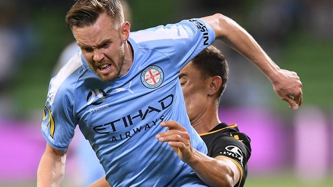 Noone battles Perth’s Chris Ikonomidis for the ball. Picture: Getty Images