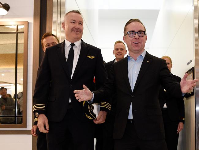 Qantas Captain Sean Golding and Qantas Group CEO Alan Joyce are seen arriving at Sydney International Airport after the non-stop flight. Picture: AAP